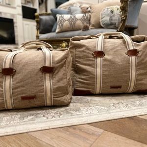 Dooney & Burke Duffle set. Excellent condition. Authentic, made in Italy.